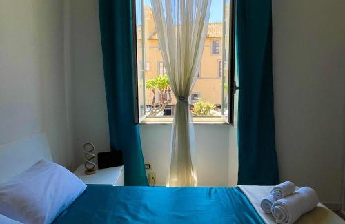 Nettuno Apartamento | NIMPHAEA BLUE APARTMENT - Elegant Central Flat, Walk to Beach & Train Station