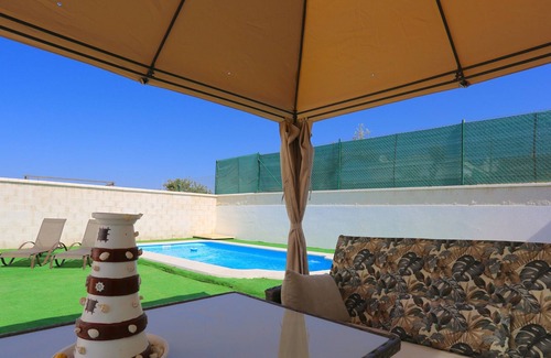 Vélez-Málaga Chalet De Esquí | Beach house, 5 bedrooms & 10 sleeps, parking, A/C, WIFI, BBQ, sights, quite area