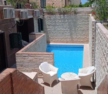 Marina El Alamein Apartamento | no 4and5 Basement Chalets 2 Beds Green Beach on the pool 114b