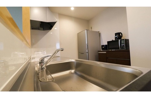 Kumejima Hotel | Nonsmoking deluxe family twin room without meals / Shimajiri-gun Okinawa