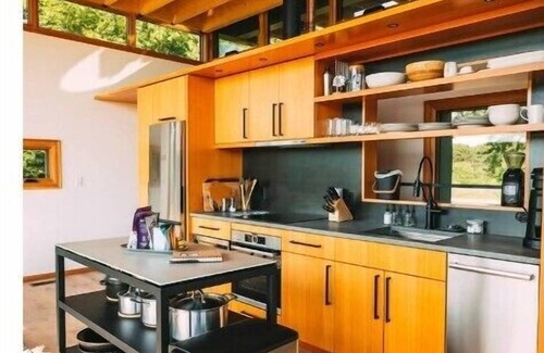 Clam Falls Cabina | Nordlys Lodging Co. - MetalLark Tower