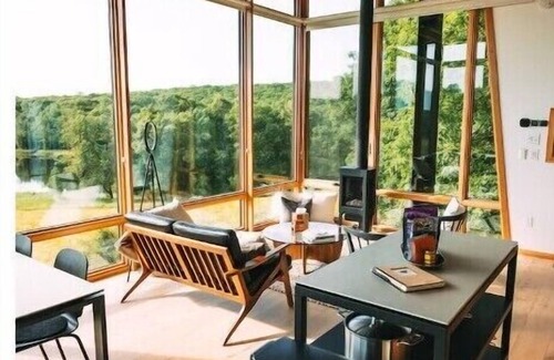 Clam Falls Cabina | Nordlys Lodging Co. - MetalLark Tower