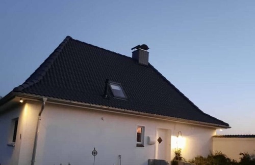 Wobbenbull Casa | Casa de vacaciones Nordseeblick en un lugar aislado con vistas al mar y perro
