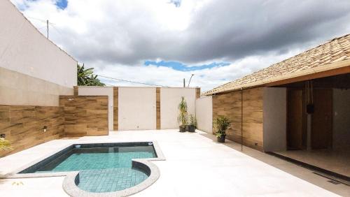 Bom Pastor Casa | NossoApê Guarua: Piscina | Churrasqueira | Ar-condicionado
