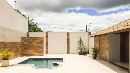 Bom Pastor Casa | NossoApê Guarua: Piscina | Churrasqueira | Ar-condicionado