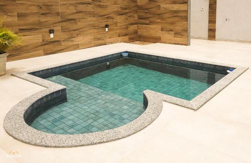 Bom Pastor Casa | NossoApê Guarua: Piscina | Churrasqueira | Ar-condicionado