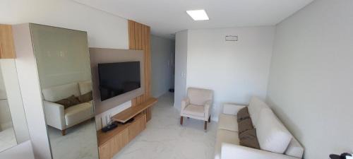 Capao da Canoa Apartamento | Novo apart 2d com piscina 1 quadra mar