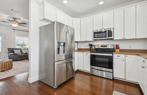 Gulfport Cabaña | Oak trees, Heated Pool/Spa oasis & walk to beach! Drive to downtown 3 min!