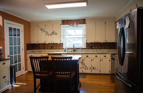 Wilmington Casa | Oasis in the middle of town for large groups with pool and 2 Master bedrooms.