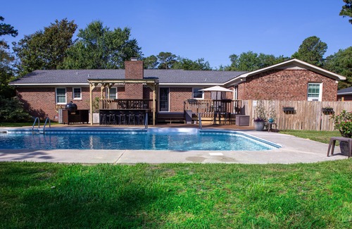 Wilmington Casa | Oasis in the middle of town for large groups with pool and 2 Master bedrooms.