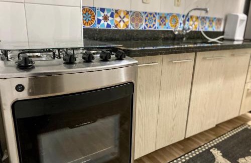 Vila Assuncao Apartamento | OC024 - Prédio Frente ao Mar | Wi-Fi | Garagem