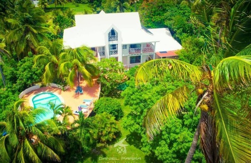 Punta Sur Villa | Ocean View Sai, casa de vacaciones de cinco dormitorios