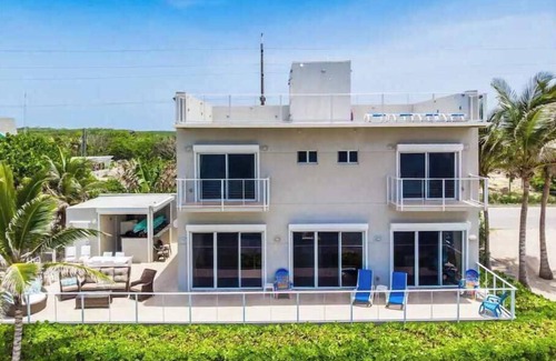 North Side Casa | Ocean's Edge: Beachfront Home with Rooftop Views