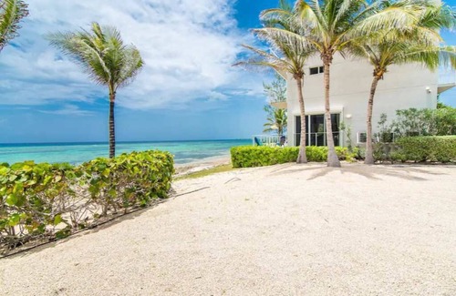 North Side Casa | Ocean's Edge: Beachfront Home with Rooftop Views
