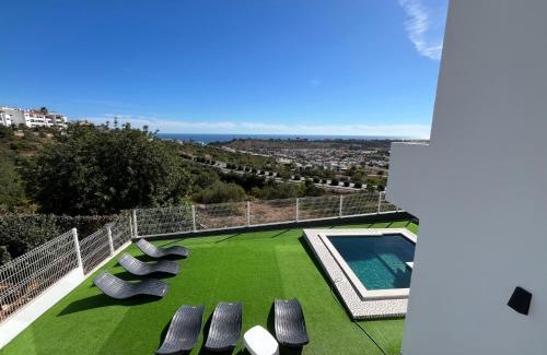 Patio Apartamento | Ocean view by Charmes C