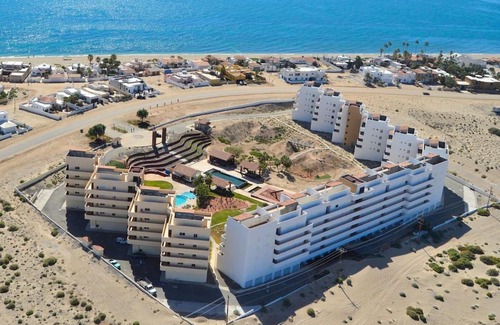 Las Conchas Casa | Ocean View Condo with Pools and Easy Beach Access