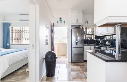 Winklespruit Apartamento | Ocean View Escape 2-bedroom apartment in Kingsburgh with AC and Private Rooftop