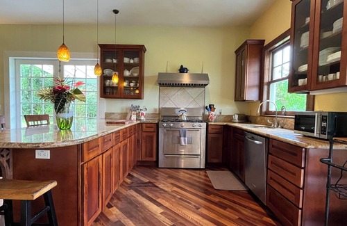Pahoa Casa | Ocean View Estate with private hiking trail and volcanically heated hot tubs.