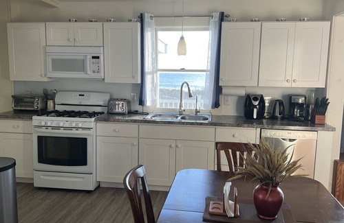 Adamsville Casa | Casa frente al mar con playa privada en alquiler