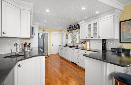 Sagamore Beach Casa | Oceanfront home on Sagamore Beach with panoramic views of Cape Cod Bay, sleeps 10