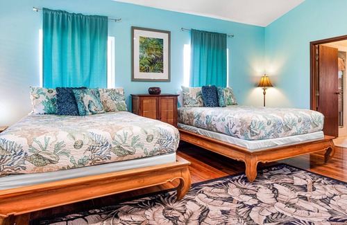 Keaau Casa | Oceanfront home with private hot tub, wraparound deck, ocean views, W/D & lanai