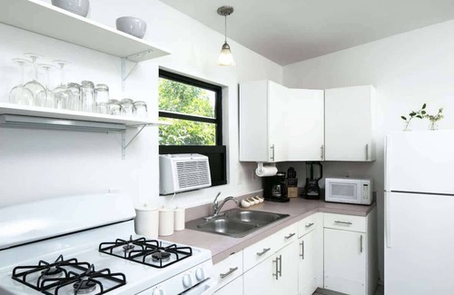 Estate Enighed Apartamento | Island Oasis: Beach & Views
