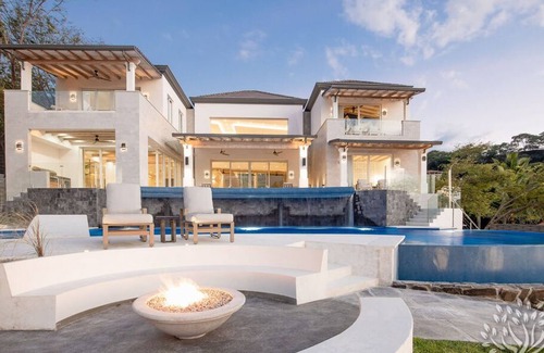 Tamarindo Villa | Oceanview Villa w/ water slide, 2 golf carts, deluxe breakfast, HK included