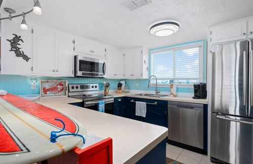 City-by-the Sea Casa | Off the Charts | Canal Front, Boat Dock + Kayaks!