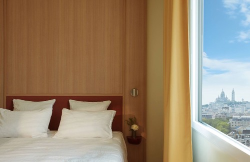 Quartier du Pont-de-Flandre Hotel | OKKO Hotels Paris Rosa Parks