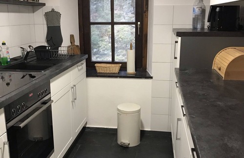 Fronhofen Casa | Antiguo molino de la granja con el agua convertida en una casa de vacaciones