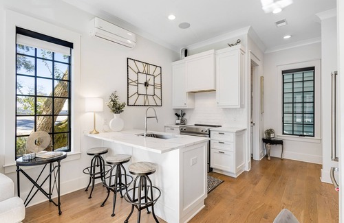 Old Village Casa | Old Village home with chic furnishings, chef's kitchen, patio, W/D, & central AC