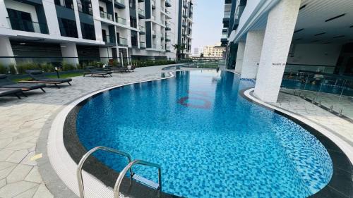 International City Apartamento | Olivz Residence Furnished Cozy Studio Apartment