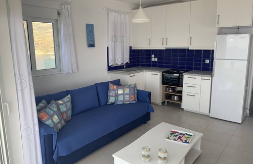Karystos Apartamento | "On the Rocks" - Cycladic beachfront apartment with spectacular views