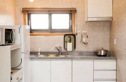 Seongsan Apartamento | On The Stone Pension