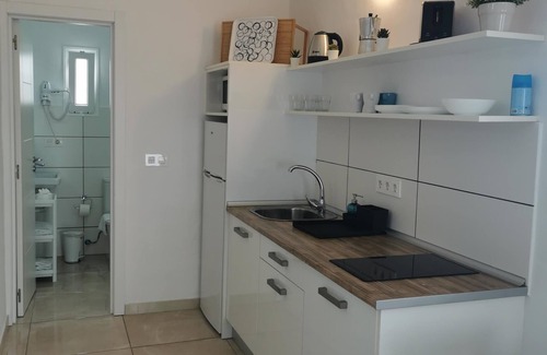 Teguise Apartamento | Apartamento Superior con terraza comedor exterior y vistas jardin.