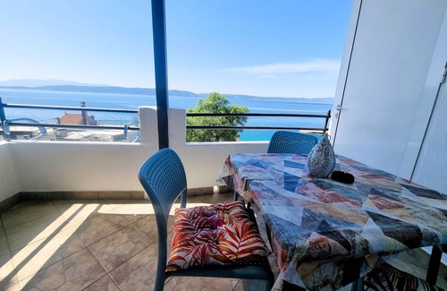 Zivogosce Apartamento | Apartamento de una habitación con balcón y vista al mar Zivogosce - Porat, Makarska (A-16289-c)