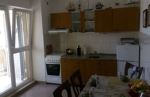 Municipality of Trogir Apartamento | Apartamento de una habitación con balcón y vista al mar Mastrinka, Ciovo (A-24035-a)