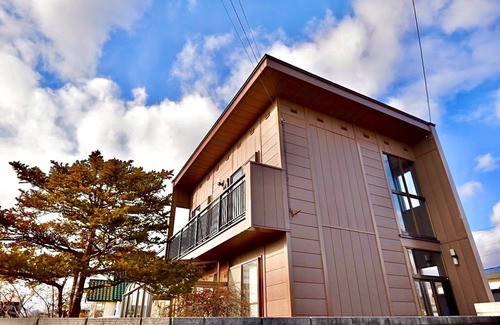 Shiraoi Casa | One group one building with natural hot springs / Shiraoi-gun Hokkaidō