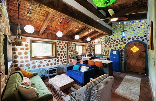 Lupton City Cabina | One-of-A-Kind: Handmade Glass Bottle & Cedar Cabin