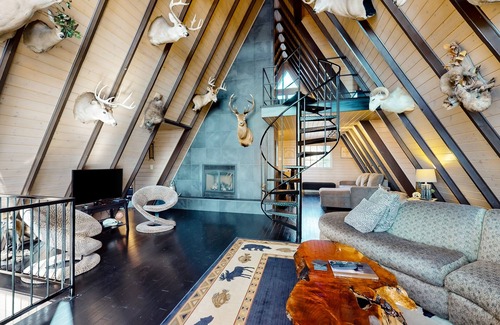 Eagle River Casa | One-of-a-kind lakefront A-frame overlooking Echo Lake with theater room
