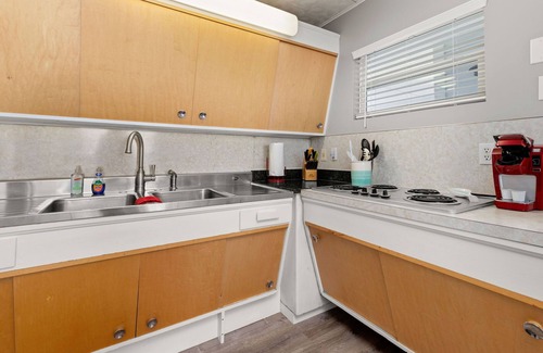 New Braunfels Cabina | One of a Kind Vintage Lakefront Getaway on Lake Dunlap--W/D, fire pit, 4 tvs