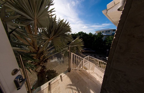 Summerland Key Casa | Mansión de playa multimillonaria en acres con piscina y billar