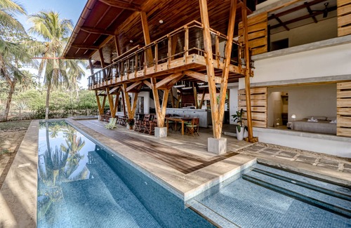 Javilla Casa | Open, dog-friendly, beachfront house with a private pool, pool spa, & WiFi