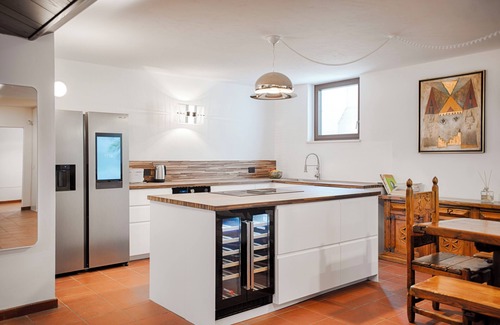 Gries - Quirein Condominio | Open Space Basement