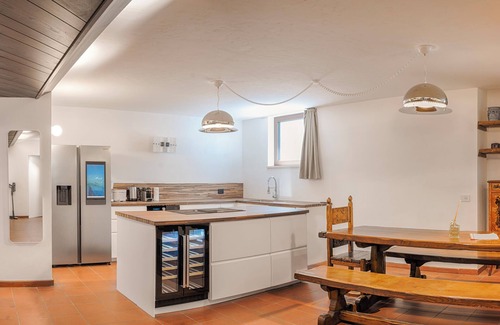 Gries - Quirein Condominio | Open Space Basement