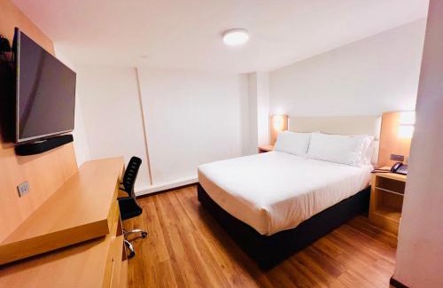 Distrito de Cerro Colorado Casa | OQ STANDARD HOTEL - Airport
