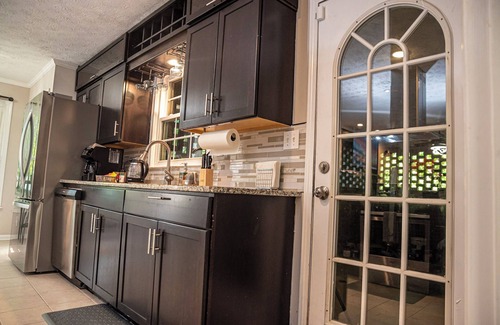Sandtown Casa | ORANGE OASIS near Atl airport, downtown, shopping, dining backyard firepit