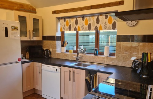 Norwich Casa | Orchard Barn, un escape del sur de Norfolk, perfecto para ti y tu perro.