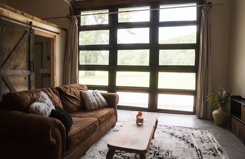Cullowhee Casa | Oscar's Barn- Relax and unwind at our mountain barn on the river.