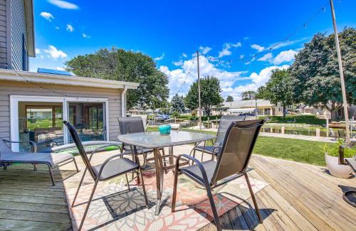 Oshkosh Casa | Oshkosh Canal-Front Home with Sunroom and Watercraft!
